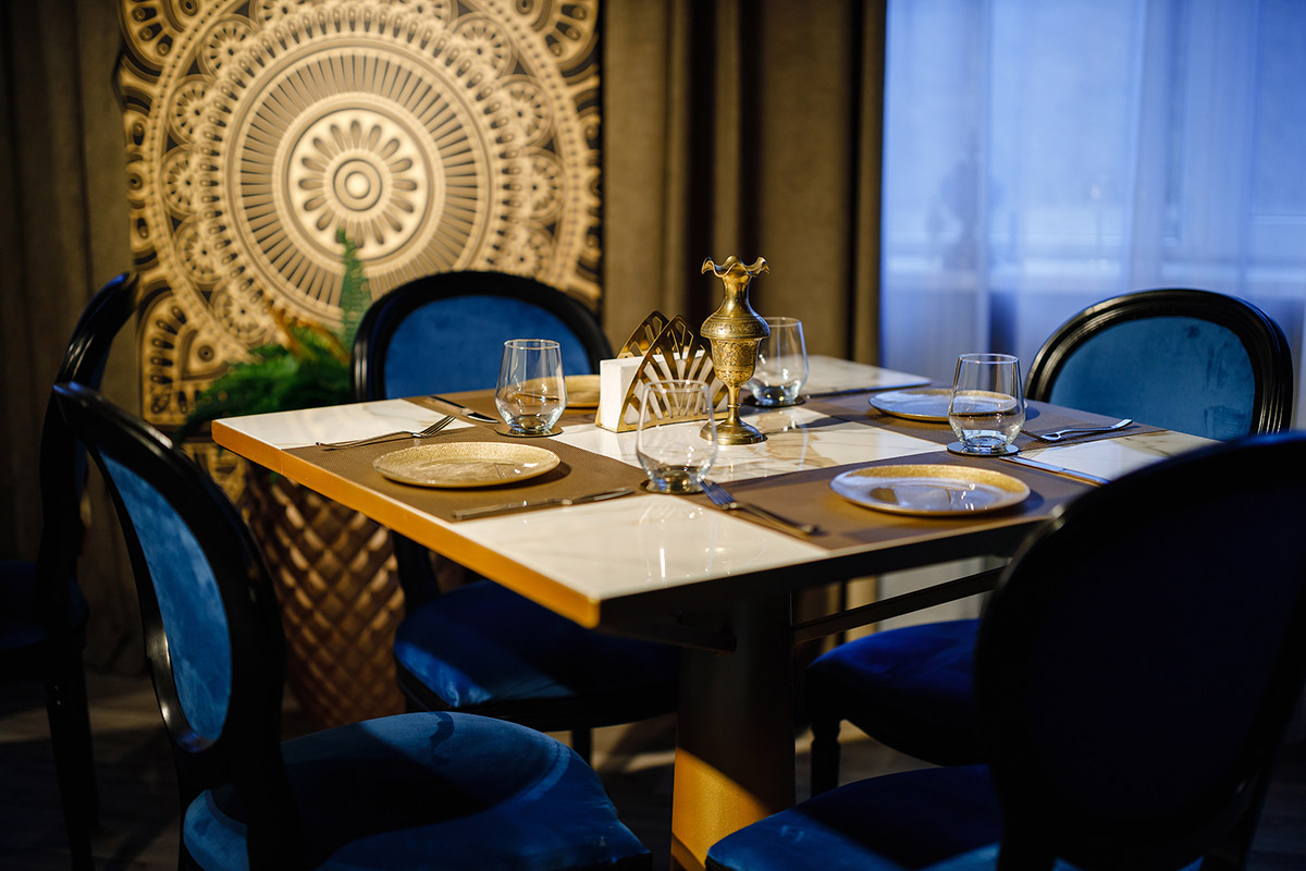 Restaurant interior design with golden and blue shades